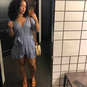 Wrap around ruffle sleeved striped mini dress